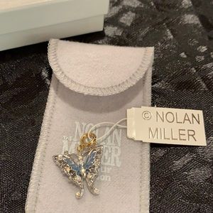 NM butterfly charm
